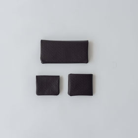 COSMIC WONDER monogram embossed light leather wallet
