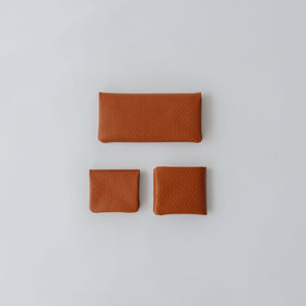 COSMIC WONDER monogram embossed light leather wallet
