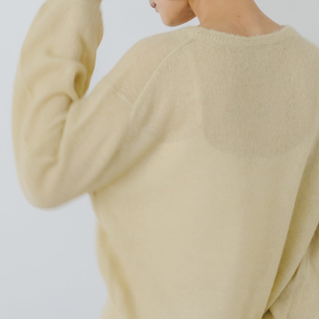 HAU ニットトップス "brume"